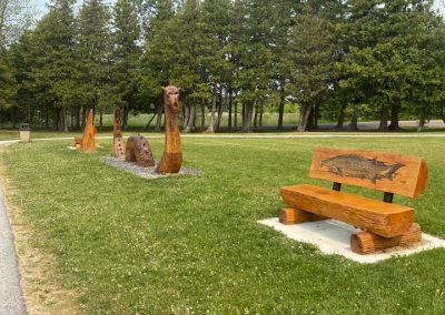 Wooden Champ and Bench by the Walking Path in St. Albans Bay